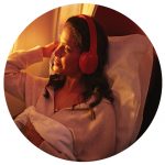 Business Travel News - December - woman flying on Virgin Atlantic plane
