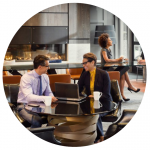 Business people working together in a Hilton hotel lobby