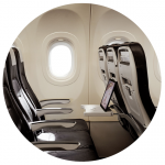 Interior of a SWISS short-haul aircraft with a laptop on the seat table